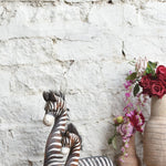 Ekaurr Savanna Rest set of 2 handcrafted resting animal figurines in earthy natural tones, artisan decorative sculpture pair for shelves and nature-inspired home decor