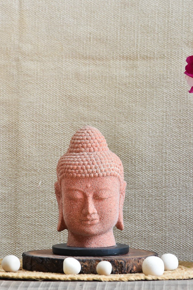 Ekaurr Serene Buddha handcrafted ceramic figurine with a calm meditative expression and natural earthy finish, artisan spiritual home decor sculpture for sacred or living spaces