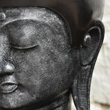 Ekaurr Serene Presence Buddha Head Sculpture side profile showing carved facial detail and serene expression in natural stone finish