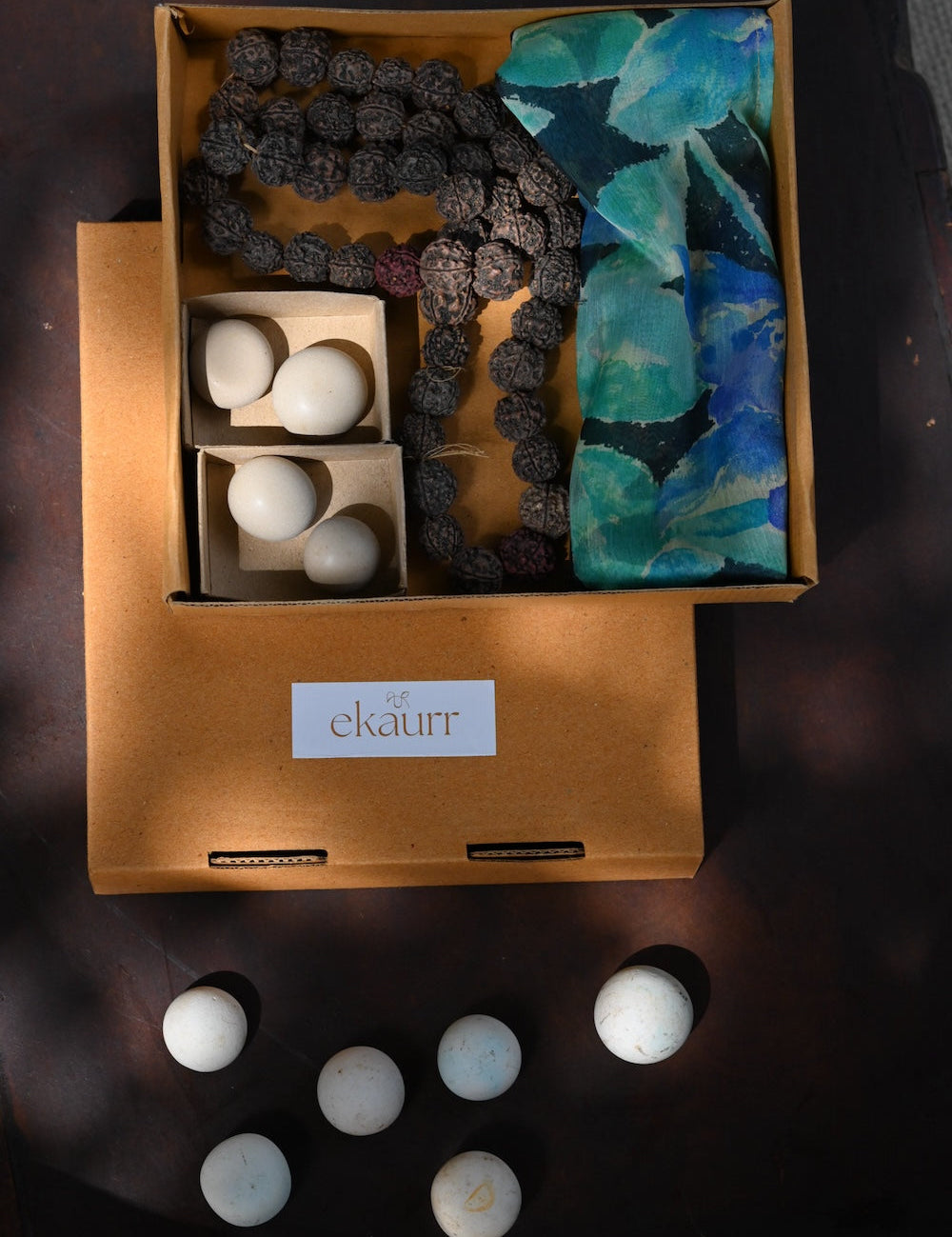 Ekaurr Serenity Gift Box curated artisan gift set of calming home decor pieces in natural materials including candle holders stones or terracotta accents with complimentary greeting card, mindful sustainable gifting for meditation wellness and serene home styling