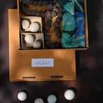 Ekaurr Serenity Gift Box curated artisan gift set of calming home decor pieces in natural materials including candle holders stones or terracotta accents with complimentary greeting card, mindful sustainable gifting for meditation wellness and serene home styling