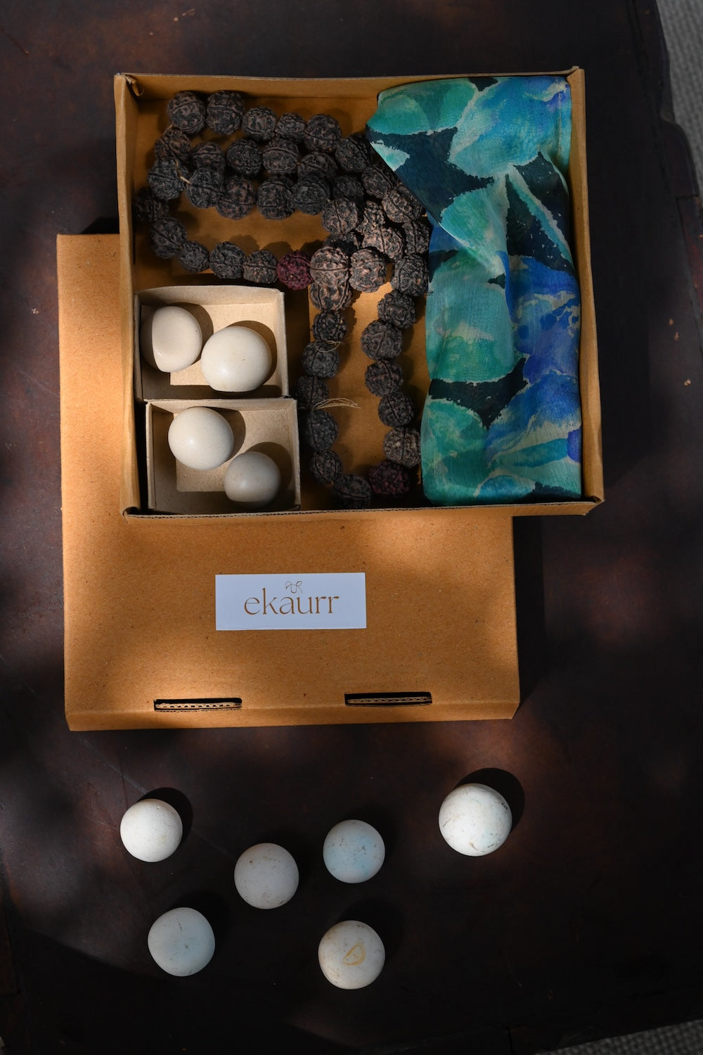Ekaurr Serenity Gift Box curated artisan gift set of calming home decor pieces in natural materials including candle holders stones or terracotta accents with complimentary greeting card, mindful sustainable gifting for meditation wellness and serene home styling