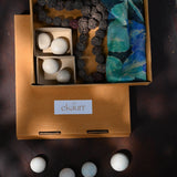 Ekaurr Serenity Gift Box curated artisan gift set of calming home decor pieces in natural materials including candle holders stones or terracotta accents with complimentary greeting card, mindful sustainable gifting for meditation wellness and serene home styling