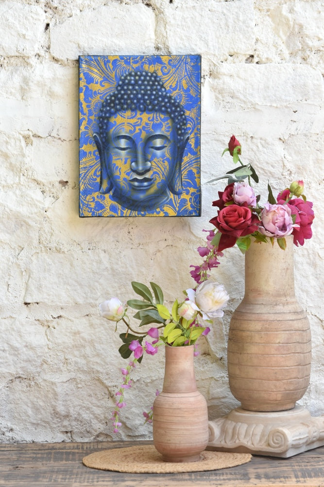 Ekaurr Serenity in Gold Buddha Wall Art original painting or mixed-media artwork of a serene Buddha figure in gold and warm tones, handcrafted spiritual wall art for meditation corners living rooms and sacred home spaces