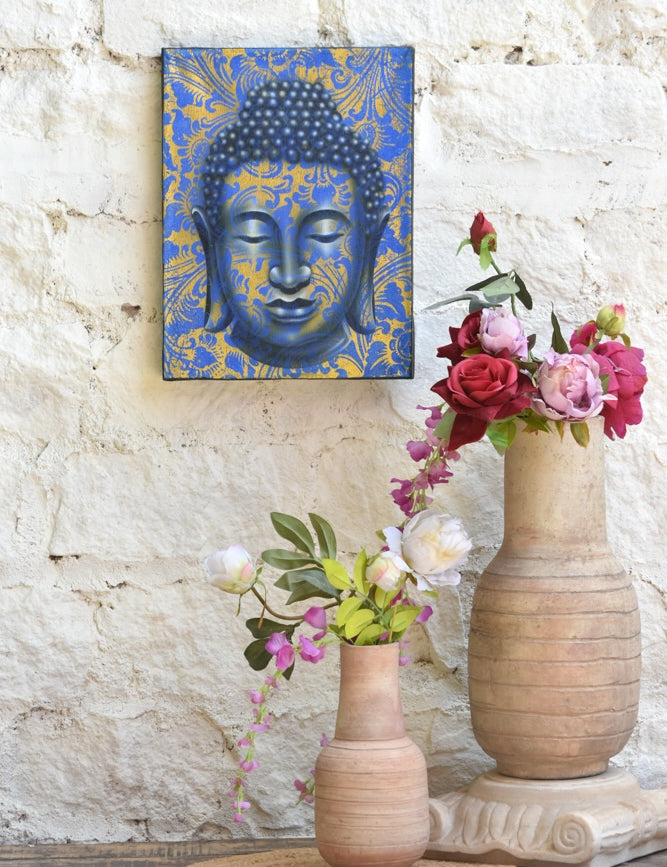 Ekaurr Serenity in Gold Buddha Wall Art original painting or mixed-media artwork of a serene Buddha figure in gold and warm tones, handcrafted spiritual wall art for meditation corners living rooms and sacred home spaces