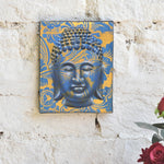 Ekaurr Serenity in Gold Buddha Wall Art original painting or mixed-media artwork of a serene Buddha figure in gold and warm tones, handcrafted spiritual wall art for meditation corners living rooms and sacred home spaces