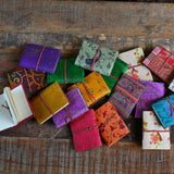 Ekaurr Set of 10 Mini Diaries handcrafted artisan pocket-sized paper diaries with fabric or printed covers in assorted designs, sustainable stationery gifting set for notes journaling and conscious everyday use