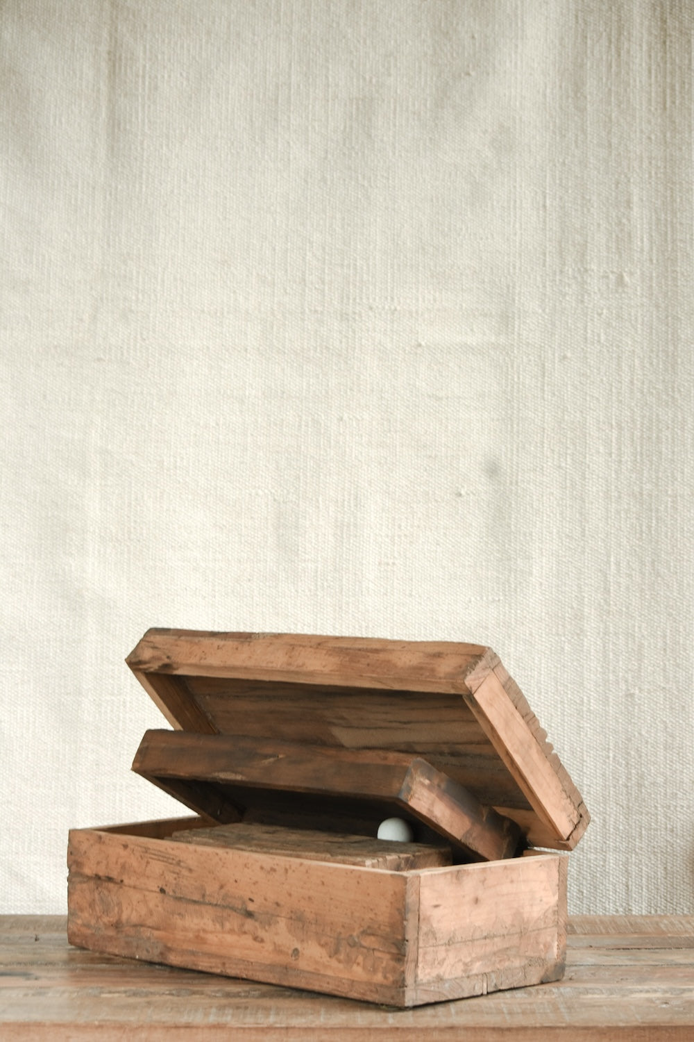 Ekaurr Nesting Wooden Boxes set of 3 shown closed with natural wood grain lids and hand-done finish