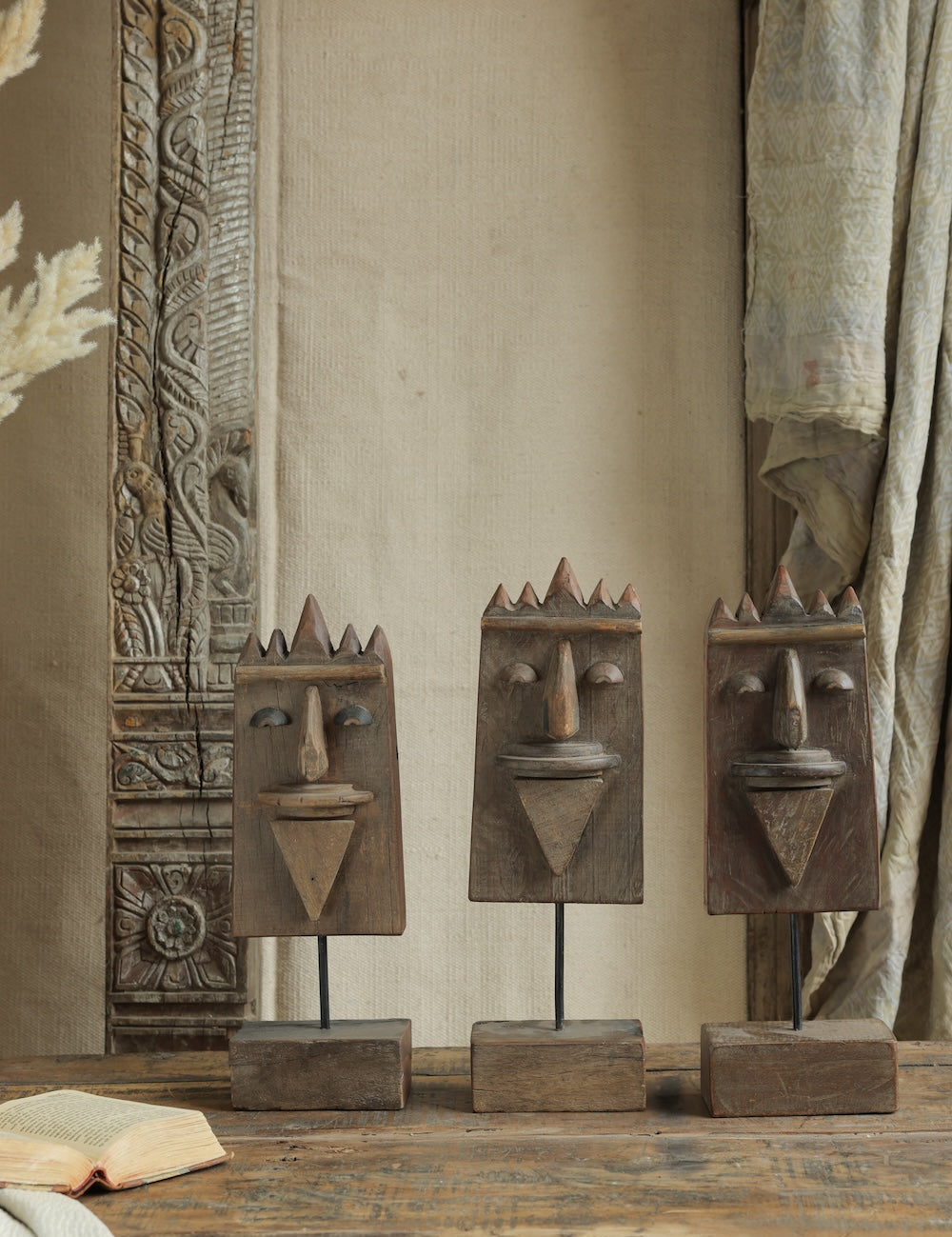 Ekaurr Set of 3 Reclaimed Wood Tribal Faces Decor hand-carved abstract tribal face forms from aged reclaimed wood in three sizes, rustic artisan wall or shelf accent set