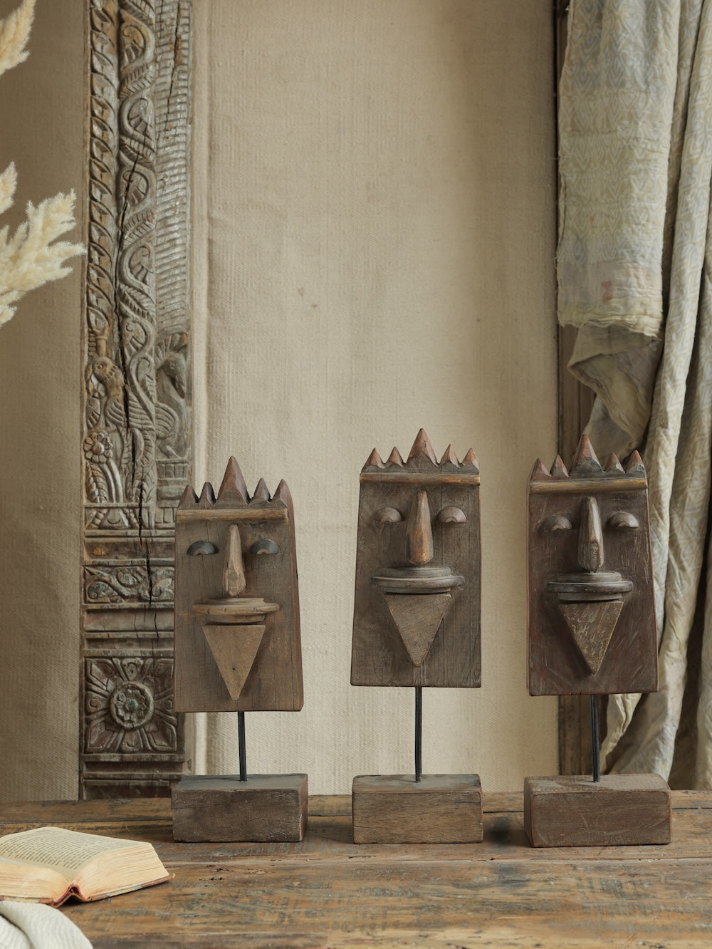 Ekaurr Set of 3 Reclaimed Wood Tribal Faces Decor hand-carved abstract tribal face forms from aged reclaimed wood in three sizes, rustic artisan wall or shelf accent set