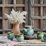 Ekaurr Set of 4 Cups 4 Saucers and 1 Kettle handmade ceramic tea service in coordinated organic glaze, complete artisan kitchen set for daily tea rituals gifting and mindful table styling