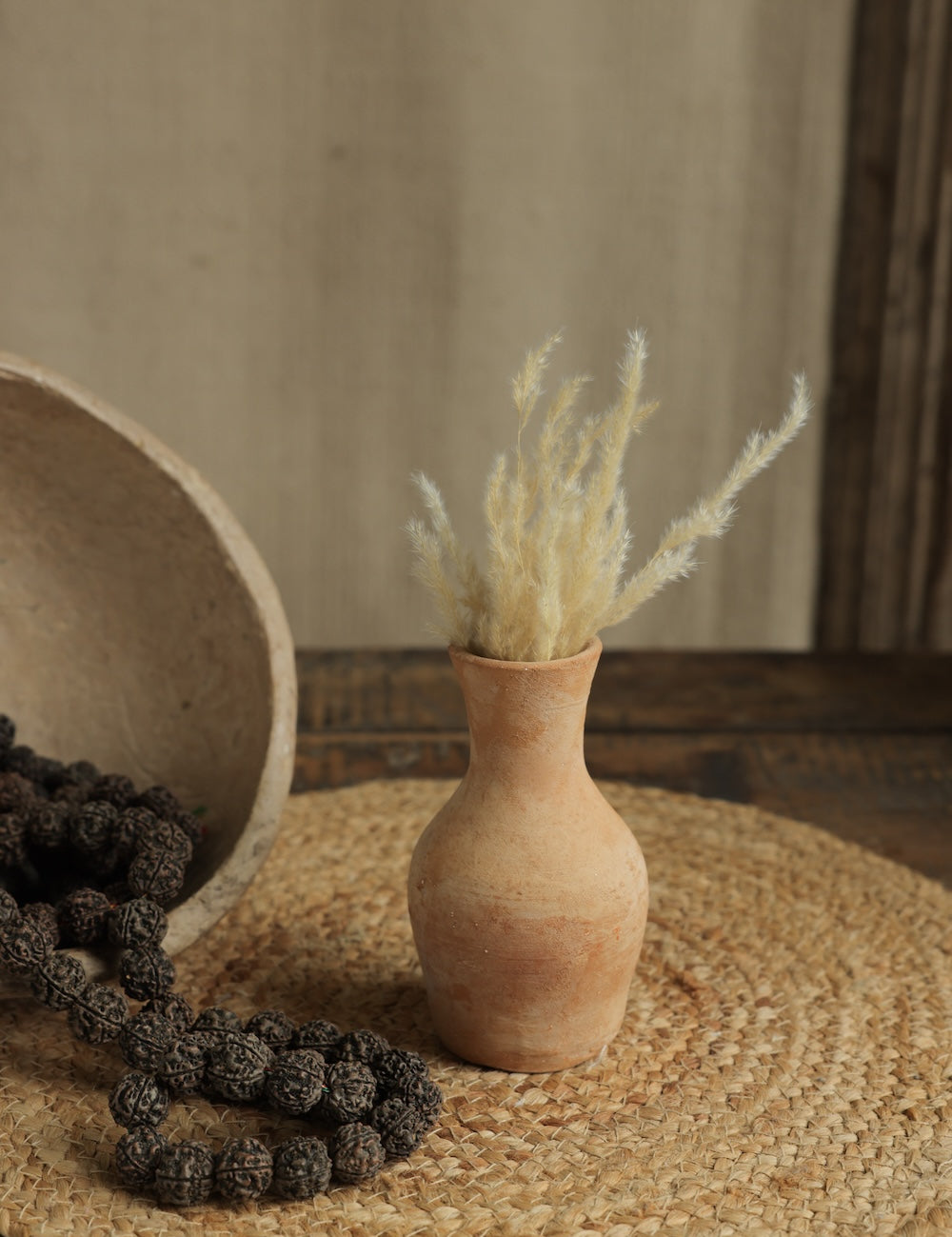 Ekaurr Set of 7 Terracotta Planters mixed sizes flat lay showing variety of handcrafted forms and natural texture