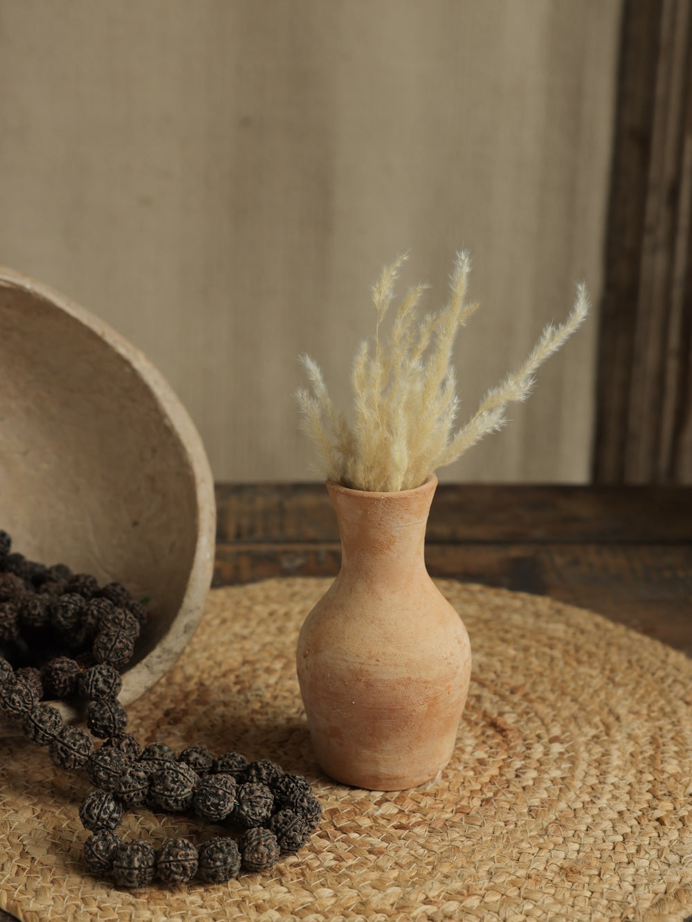 Ekaurr Set of 7 Terracotta Planters mixed sizes flat lay showing variety of handcrafted forms and natural texture