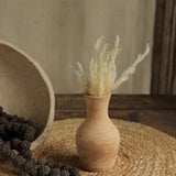 Ekaurr Set of 7 Terracotta Planters mixed sizes flat lay showing variety of handcrafted forms and natural texture