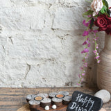 Ekaurr Stone Spark Gift Set curated artisan gift set of natural stone tea light holders with a sparkling ruby or mineral decorative accent and complimentary greeting card, elegant sustainable gifting for home styling and refined occasions