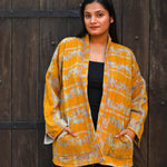 Ekaurr Sunlit Elegance Jacket handcrafted artisan jacket in warm golden or amber sunlit fabric with an elegant structured form, slow fashion statement outerwear for conscious women's styling and occasions