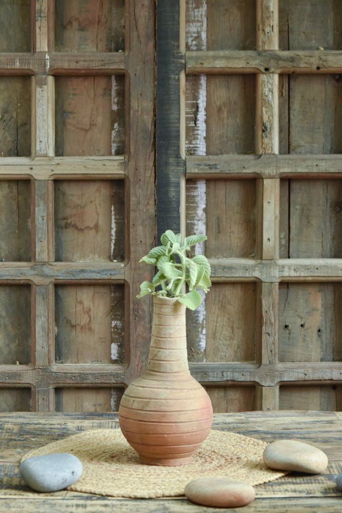 Ekaurr Surahi Form Terracotta Planter handmade by rural Indian women artisans in the slender long-necked surahi water vessel form, earthy natural terracotta home planter