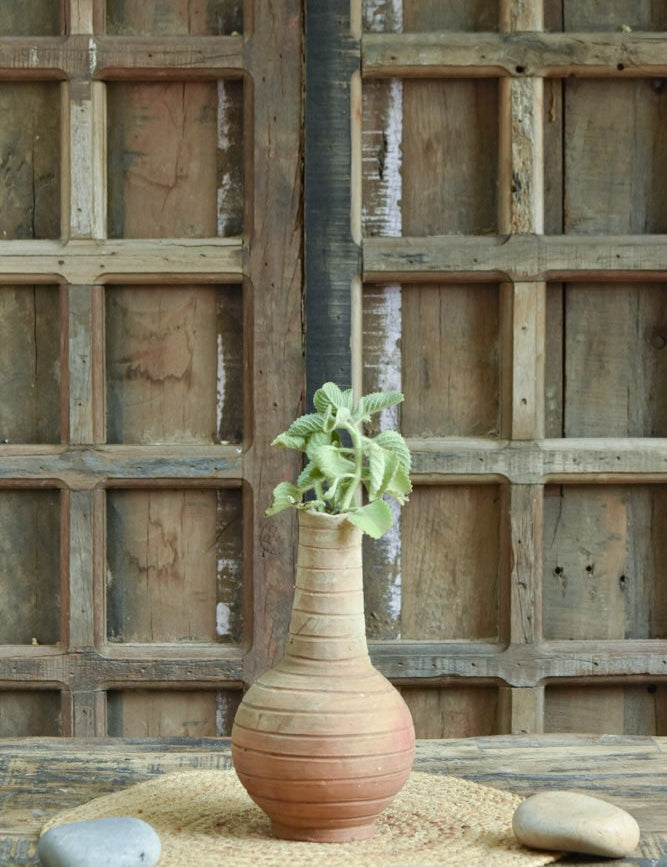 Ekaurr Surahi Form Terracotta Planter handmade by rural Indian women artisans in the slender long-necked surahi water vessel form, earthy natural terracotta home planter