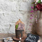 Ekaurr Tea Lights and Treasures Gift Set curated artisan gift set of handcrafted tea light holders paired with a small artisan treasure piece and complimentary greeting card, warm sustainable gifting for home ambience and cherished occasions