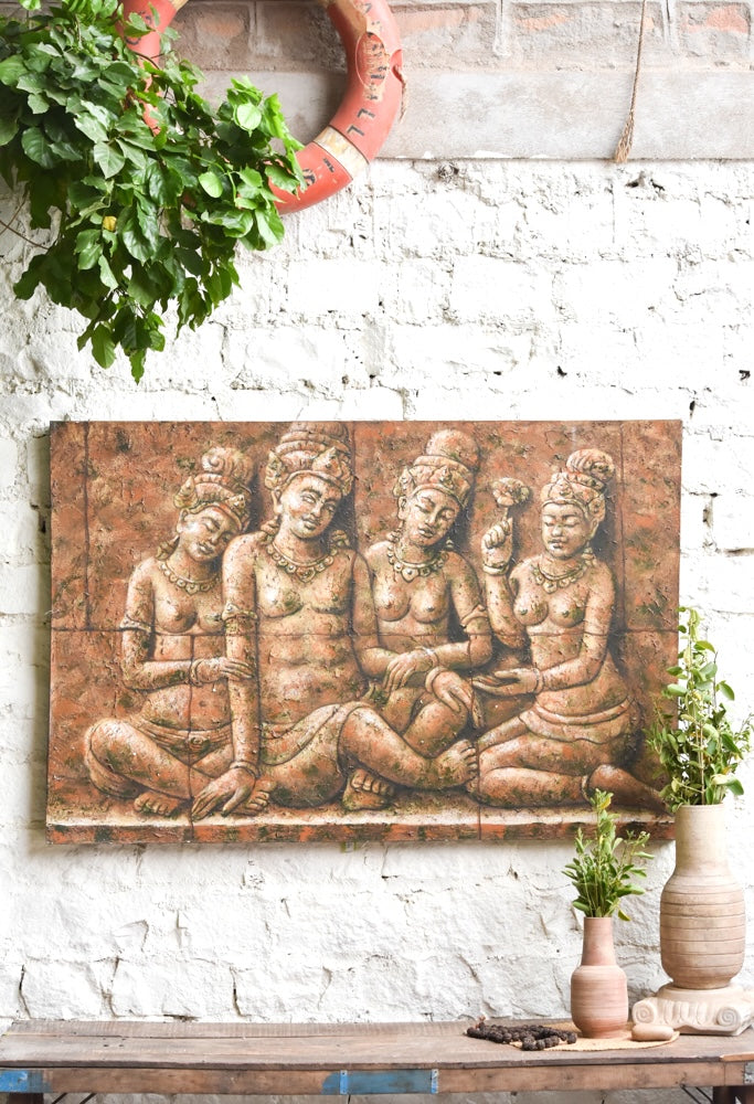 Ekaurr Temple Nymphs wall art depicting graceful apsara-like celestial figures in a classical Indian temple art style with warm gold and terracotta tones, handcrafted spiritual home decor for living rooms and curated interiors