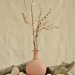 Ekaurr Terracotta Vase with rounded body and slender neck, handmade in unglazed natural clay with fabric iduni ring for stability, rustic artisan vase for floral or shelf styling