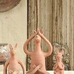 Ekaurr Set of 3 Terracotta Yoga Bunnies handcrafted natural clay bunny figurines each in a different yoga pose, playful artisan terracotta decor for shelves gifting and nature-inspired styling
