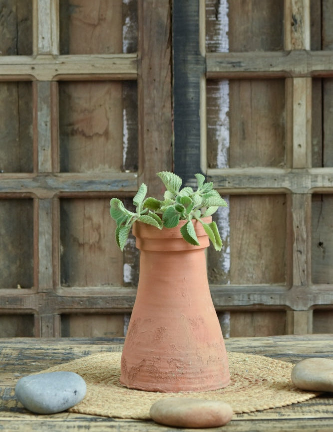 Ekaurr Thathera Cone Terracotta Pot handmade by rural Indian women artisans in tapered cone form inspired by traditional craftsmanship, earthy natural terracotta planter