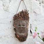 Ekaurr The Flame Keeper Mask, hand-carved aged wood tribal mask with flame-like protrusions and forehead symbol, one-of-a-kind vintage ritual wall art