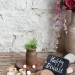 Ekaurr The Forest Flame Gift Set curated artisan gift set of forest stone or reclaimed wood tea light holders with natural earthy accent pieces and complimentary greeting card, nature-inspired sustainable gifting for home ambience and woodland-styled spaces