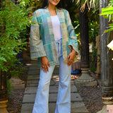 Ekaurr Tidal Patch Kimono handcrafted kantha or patchwork fabric open kimono in ocean-toned blue and teal patchwork panels, artisan slow fashion layering piece for boho and conscious women's styling
