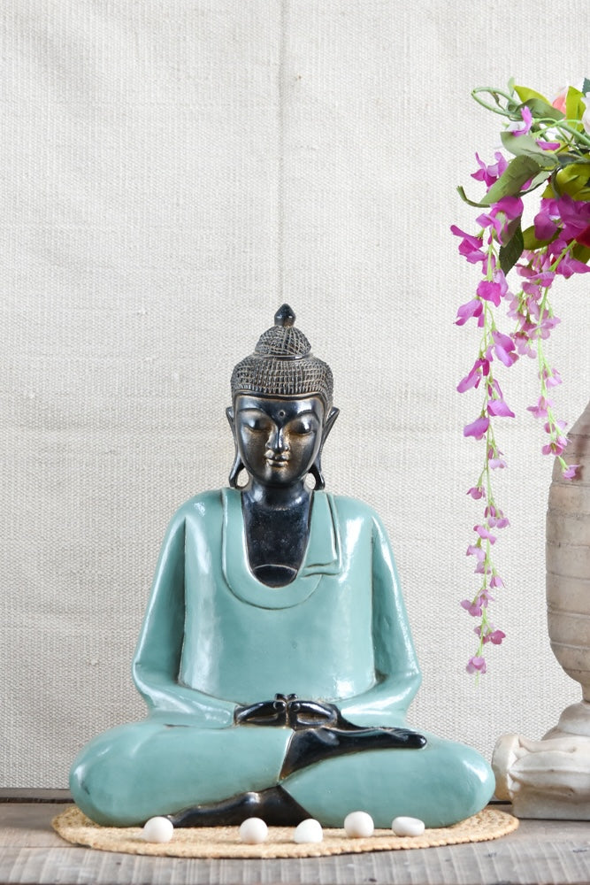 Ekaurr Tranquil Stillness Buddha handcrafted ceramic figurine with a deeply meditative closed-eye posture, artisan spiritual home decor piece for altars and shelves
