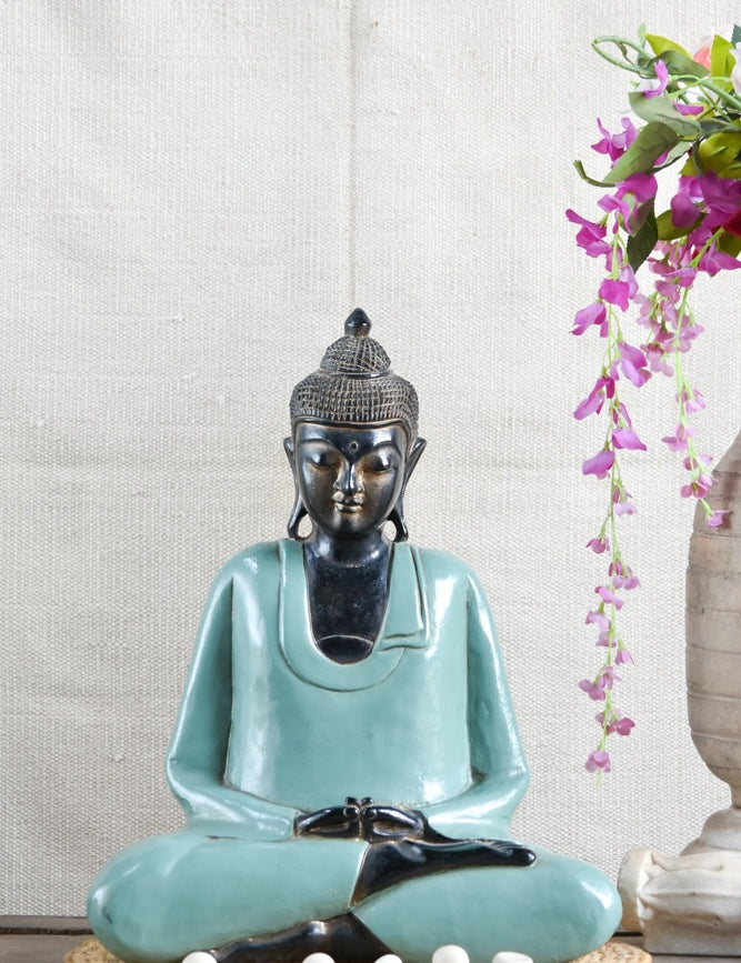 Ekaurr Tranquil Stillness Buddha handcrafted ceramic figurine with a deeply meditative closed-eye posture, artisan spiritual home decor piece for altars and shelves