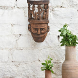 Ekaurr Tribal Crown Mask hand-carved wooden wall mask featuring village life scene carved atop the crown, vintage one-of-a-kind heritage statement décor