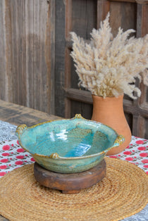 Ekaurr Turquoise Serving Bowl handmade ceramic serving bowl in vibrant turquoise glaze with organic hand-thrown form, artisan kitchen essential from the Liora charity collection for dining and table styling