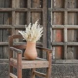 Ekaurr Vintage Accent Chair in brown reclaimed wood with natural imperfections and rustic patina, small handcrafted decorative seat or plant stand