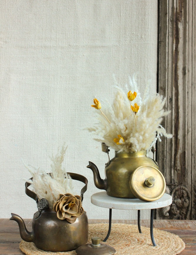 Ekaurr Vintage Brass Kettle Planter upcycled antique brass kettle with aged patina and handle, repurposed as a rustic botanical planter with dried pampas grass and paper flower accent