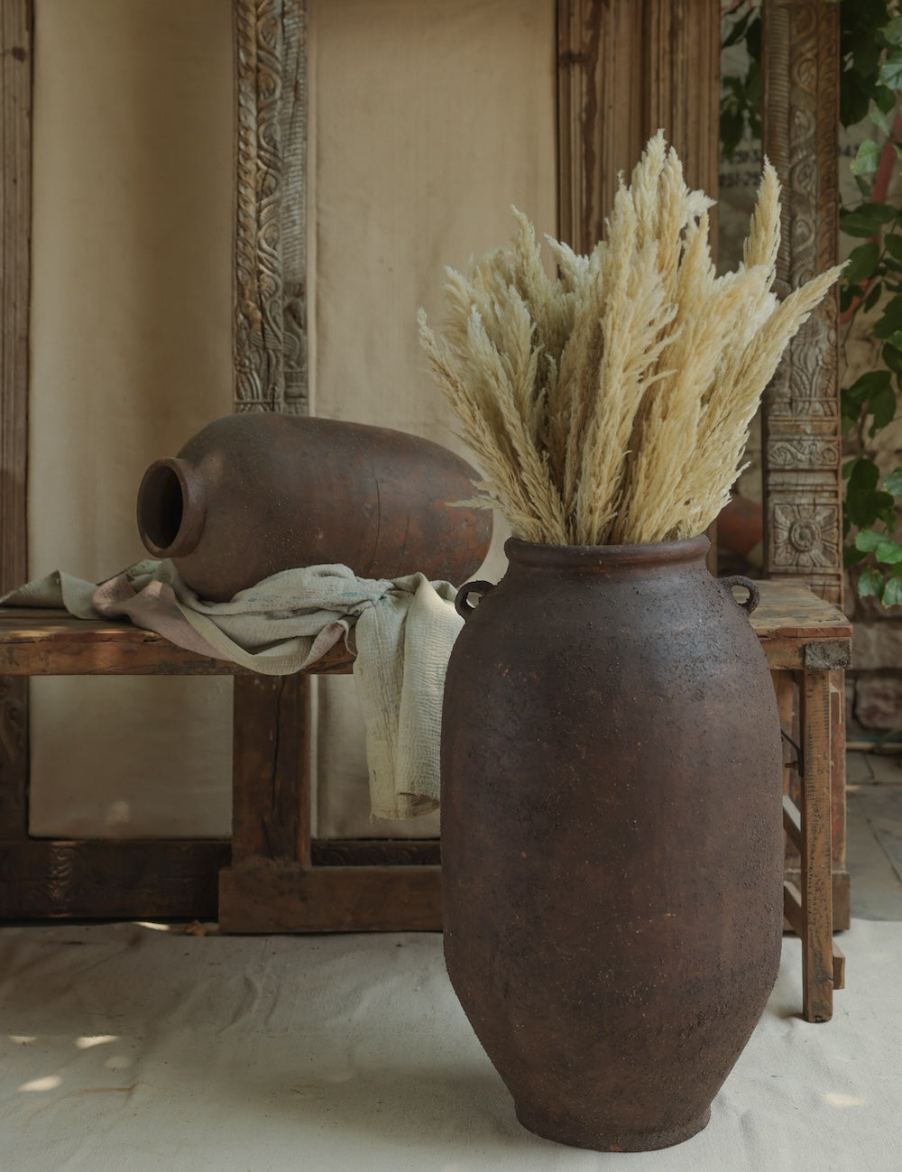 Ekaurr Volcano Terracotta Urn Large dark brown stone finish handmade by Indian artisans oversized statement planter or focal decor piece