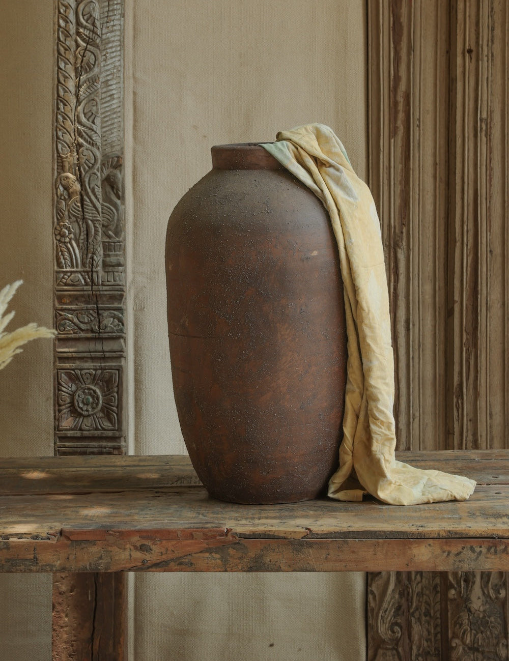 Ekaurr Volcano Terracotta Urn Small dark brown rugged texture handmade by Indian artisans decorative planter with vintage patina