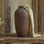 Ekaurr Volcano Terracotta Urn Small dark brown rugged texture handmade by Indian artisans decorative planter with vintage patina