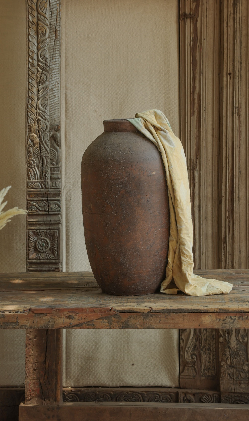 Ekaurr Volcano Terracotta Urn Small dark brown rugged texture handmade by Indian artisans decorative planter with vintage patina