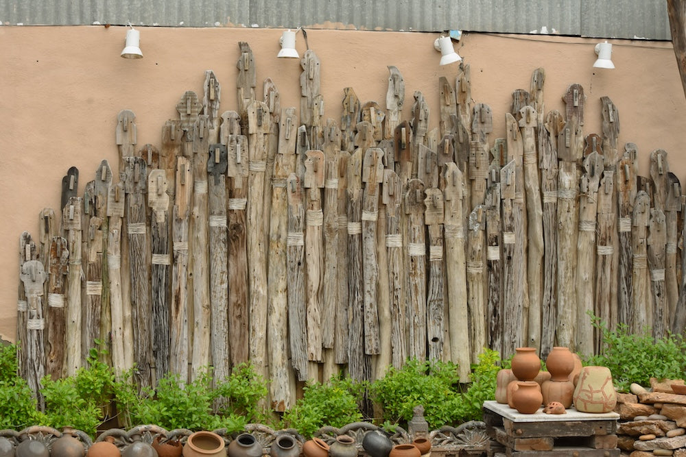Ekaurr Wall of Unity Large monumental reclaimed wood wall installation of individually varied wooden sticks symbolising collective harmony at 180x50 inches, one-of-a-kind artisan architectural statement piece for large residential commercial or institutional spaces