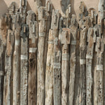 Ekaurr Wall of Unity Small large-scale reclaimed wood wall installation of varying-length wooden sticks arranged to symbolise unity in diversity at 90x50 inches, one-of-a-kind artisan architectural wall decor for statement walls and institutional or residential spaces