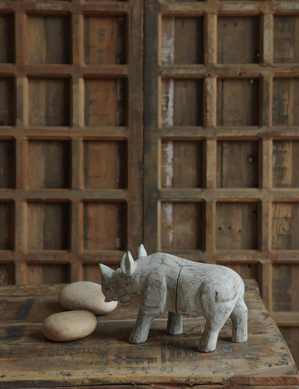 Ekaurr Distressed Whitewashed Rhino handcrafted paper mache rhino figurine with a distressed whitewash finish, rustic artisan wildlife home decor accent for shelves and eclectic interiors