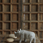 Ekaurr Distressed Whitewashed Rhino handcrafted paper mache rhino figurine with a distressed whitewash finish, rustic artisan wildlife home decor accent for shelves and eclectic interiors