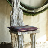 Ekaurr Whitewashed Rustic Wooden Accent Chair showing side angle with carved organic backrest and chunky solid wood legs