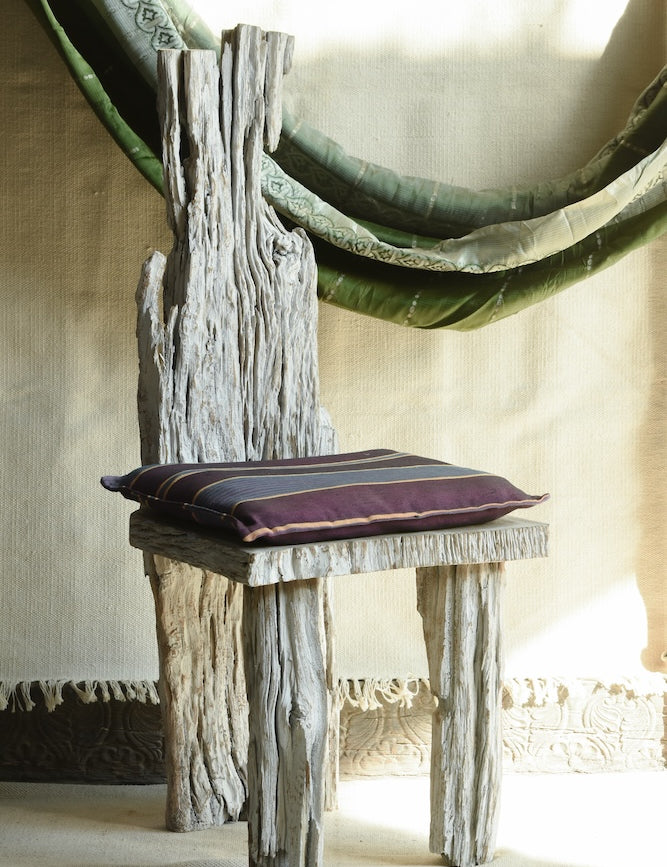 Ekaurr Whitewashed Rustic Wooden Accent Chair showing side angle with carved organic backrest and chunky solid wood legs