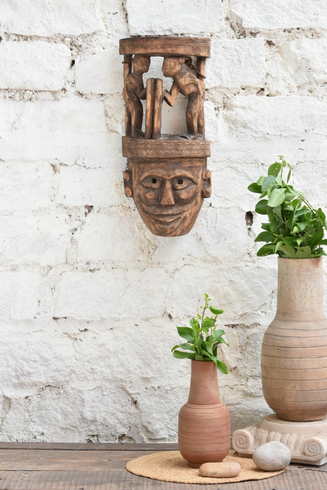 Ekaurr Wisdom Keeper hand-carved tribal wooden wall mask topped with two storytelling figures, vintage one-of-a-kind ancestral wisdom décor sculpture