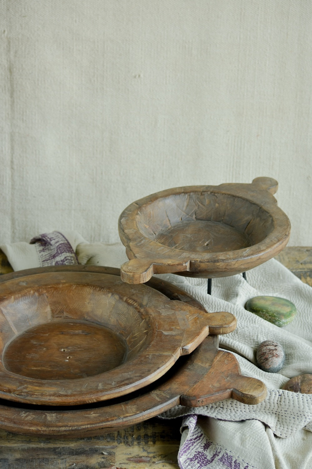 Ekaurr Wooden Paraat Set of 3 styled as decorative platters on console, showing natural wood grain finish and hand-done artisan detailing