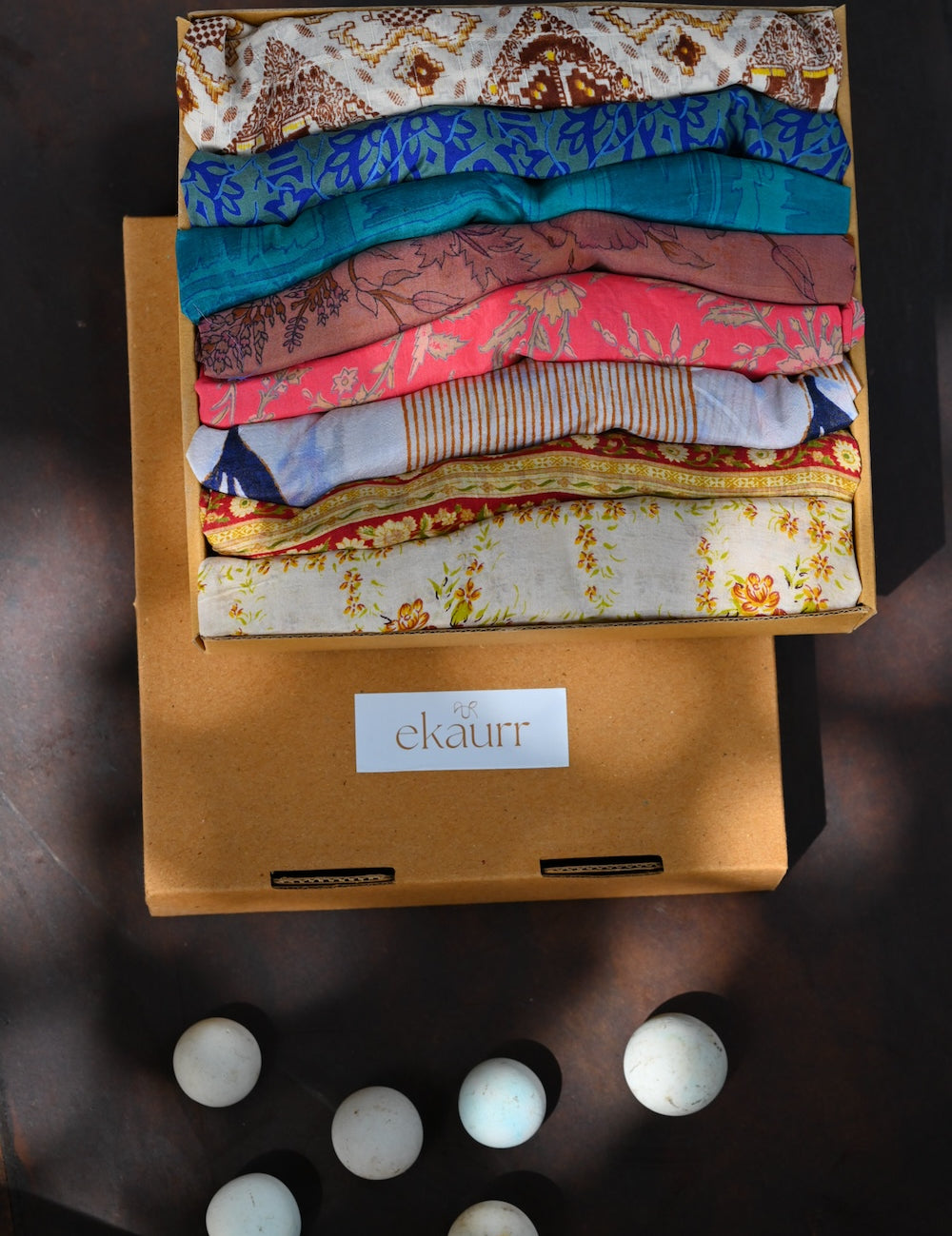 Ekaurr Wrapped Elegance curated premium artisan gift set of elegant handcrafted home decor or fashion accessories in refined natural materials with complimentary greeting card, sophisticated sustainable gifting for discerning recipients and special occasions