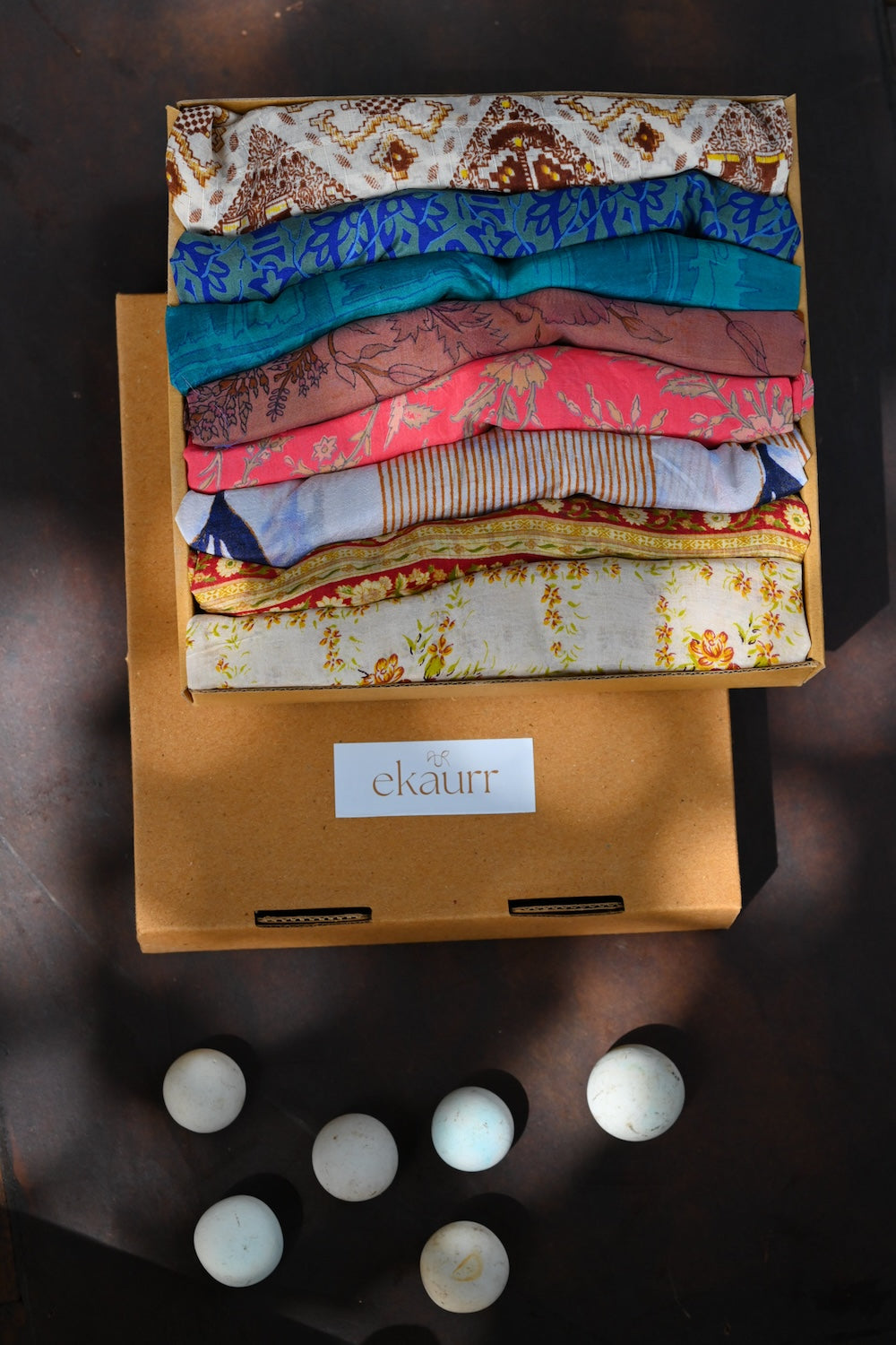 Ekaurr Wrapped Elegance curated premium artisan gift set of elegant handcrafted home decor or fashion accessories in refined natural materials with complimentary greeting card, sophisticated sustainable gifting for discerning recipients and special occasions